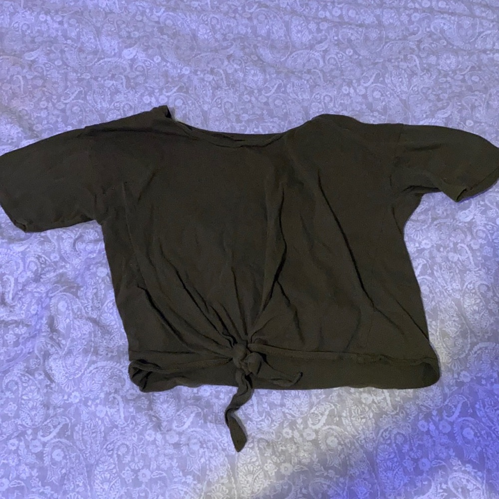 A green medium short sleeve shirt.